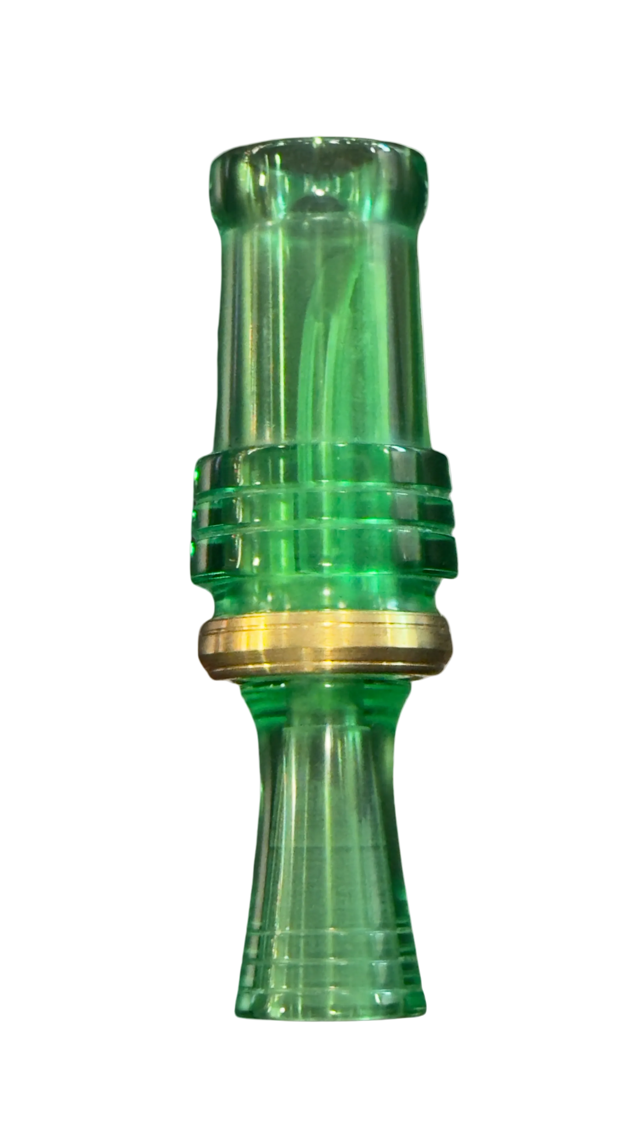 Green duck call acrylic object with a gold band on a white background